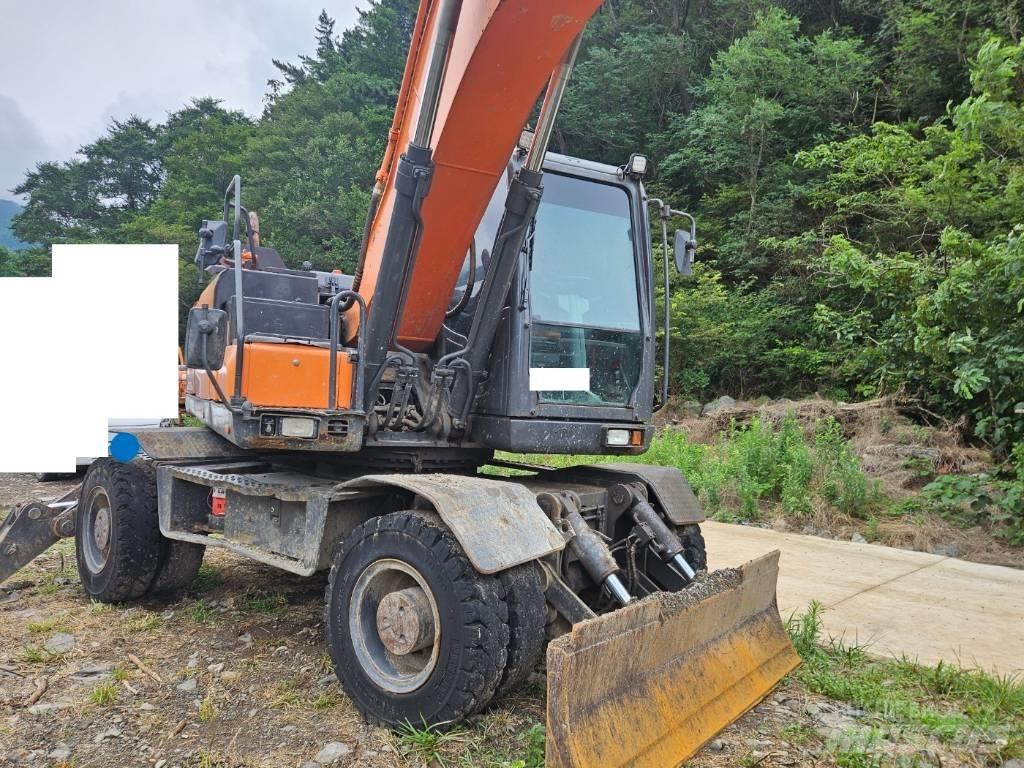 Doosan DX 210 W ホイール式油圧ショベル（パワーショベル・ユンボ・バックホー）