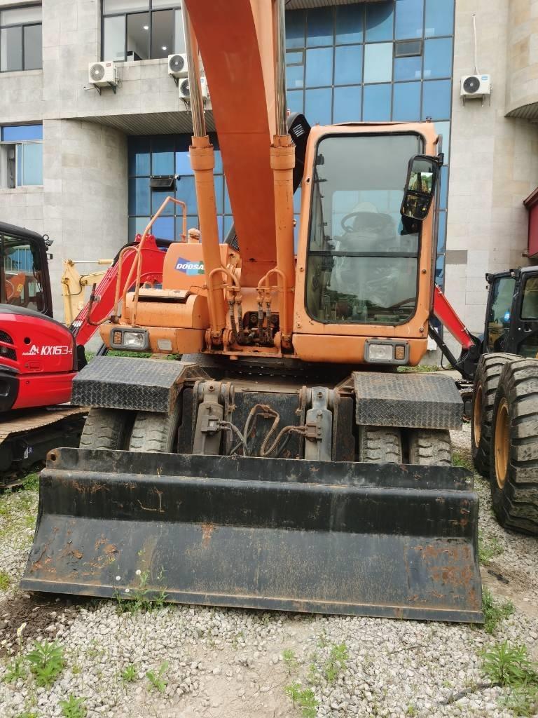 Doosan DH 210 W-7 ホイール式油圧ショベル（パワーショベル・ユンボ・バックホー）