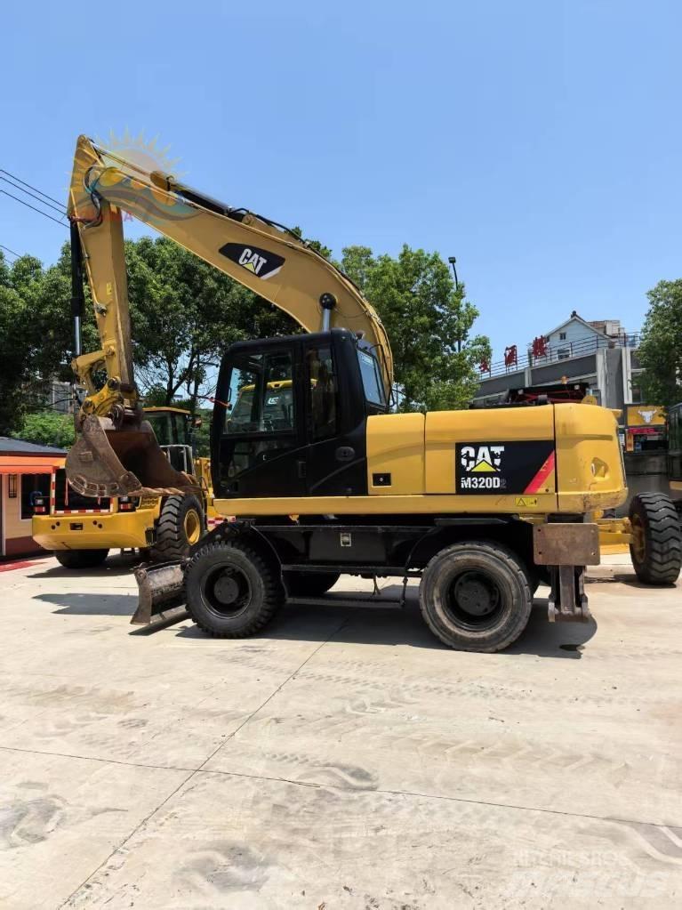 CAT M 315 D2 ホイール式油圧ショベル（パワーショベル・ユンボ・バックホー）