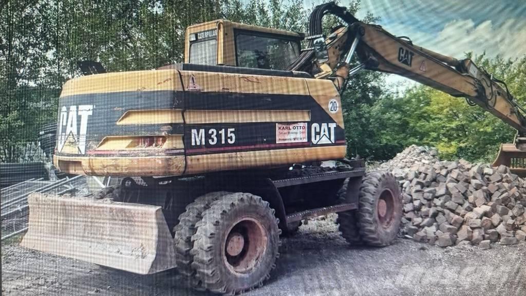 CAT M 315 ホイール式油圧ショベル（パワーショベル・ユンボ・バックホー）