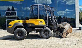Mecalac 12 M TX バックホーローダー
