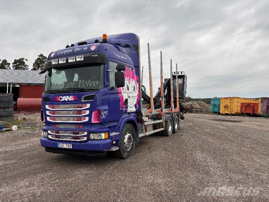 Scania 560. 6x4 木材トラック