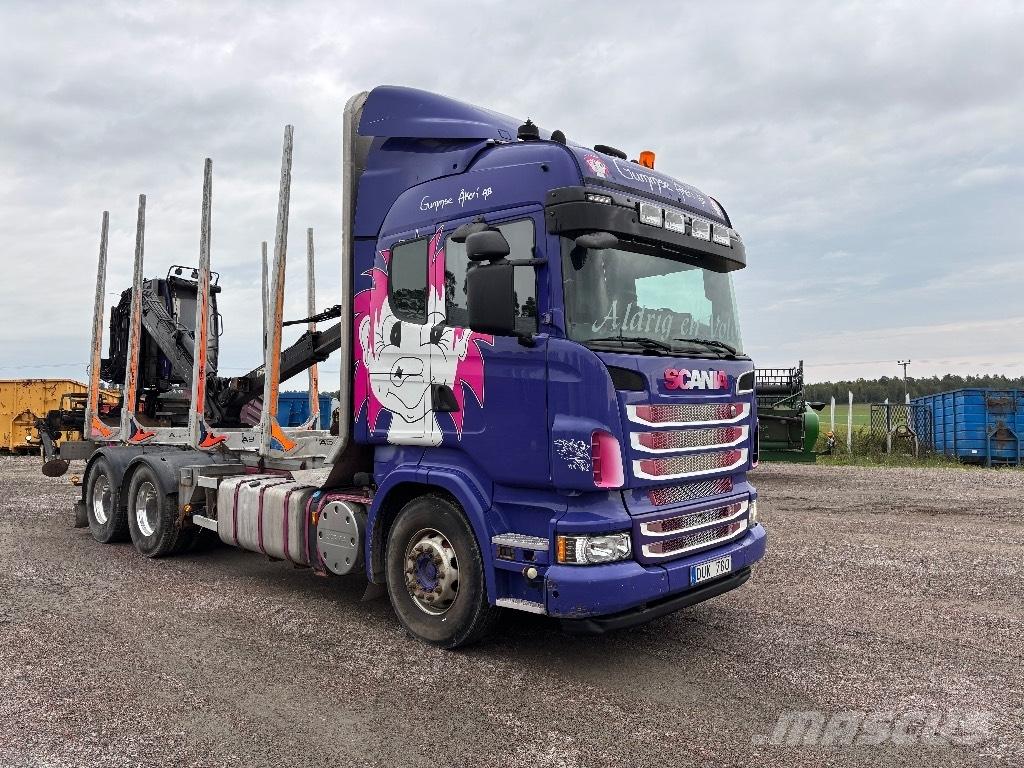 Scania 560. 6x4 木材トラック