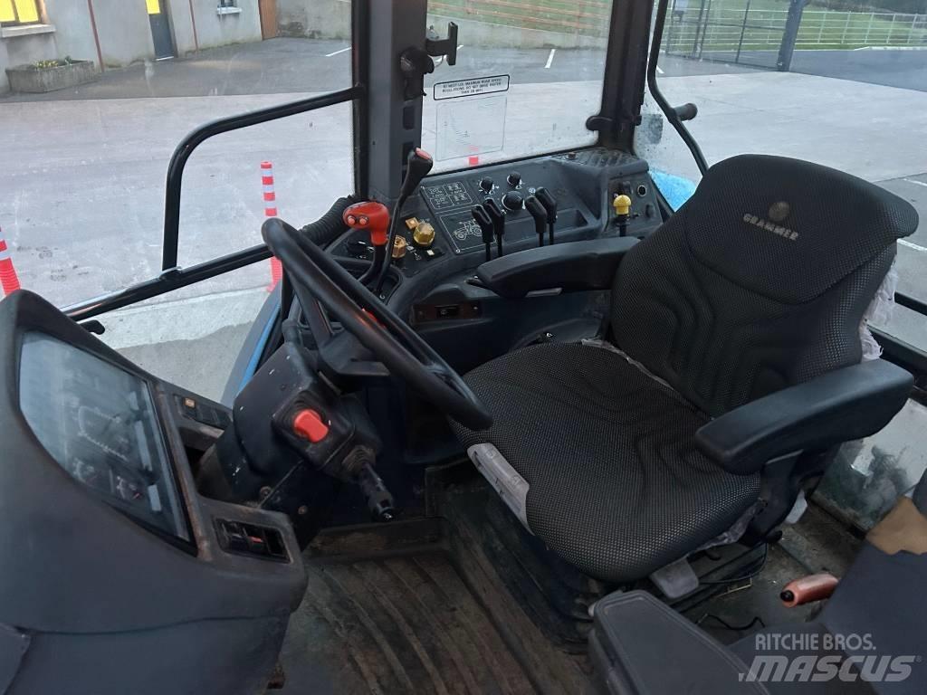 New Holland TM 140 トラクター