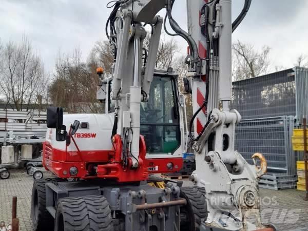 Takeuchi TB 395 W ホイール式油圧ショベル（パワーショベル・ユンボ・バックホー）