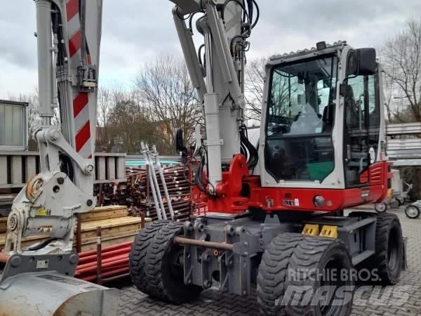 Takeuchi TB 395 W ホイール式油圧ショベル（パワーショベル・ユンボ・バックホー）