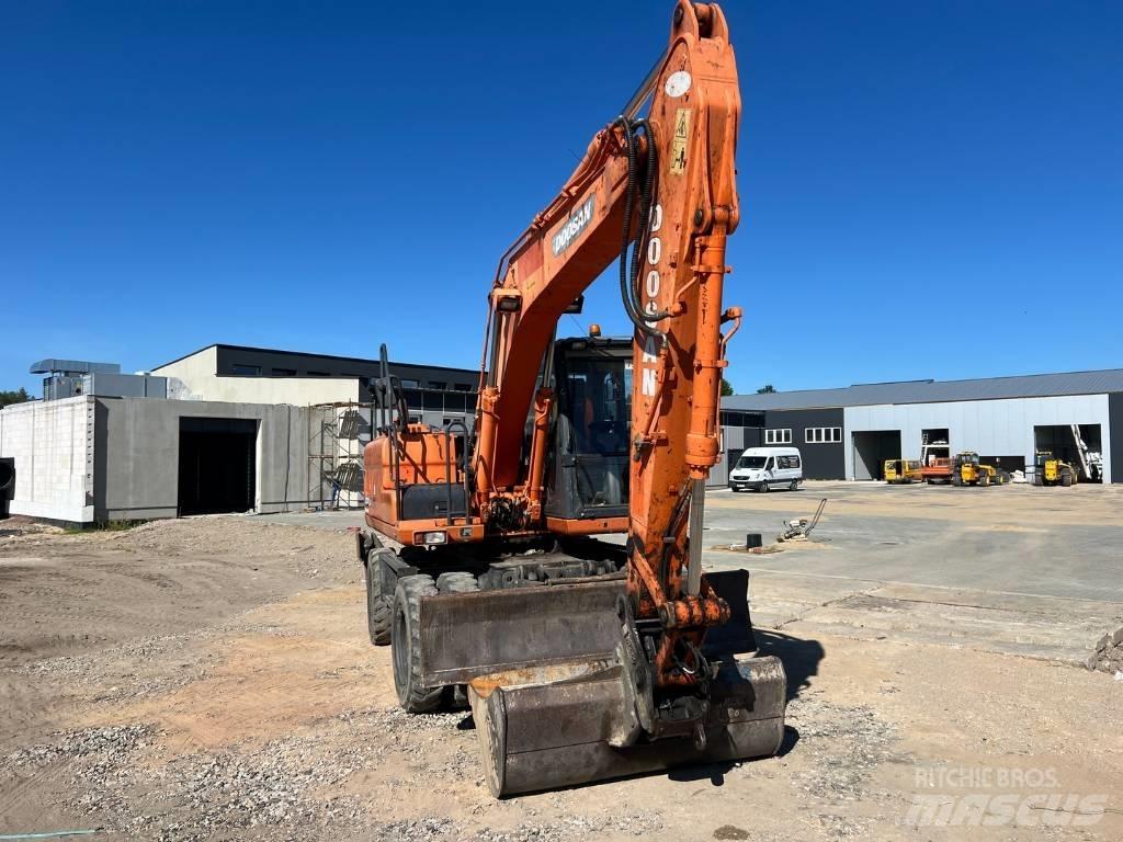 Doosan DX 140 W ホイール式油圧ショベル（パワーショベル・ユンボ・バックホー）