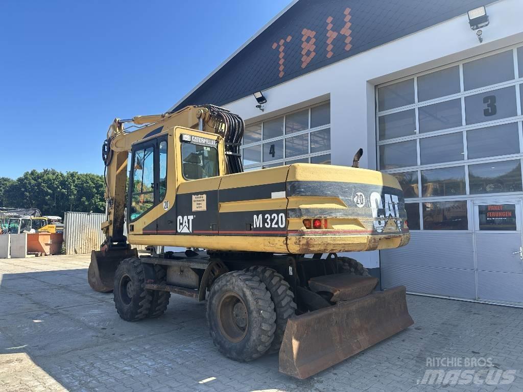 CAT M 320 VAH ホイール式油圧ショベル（パワーショベル・ユンボ・バックホー）