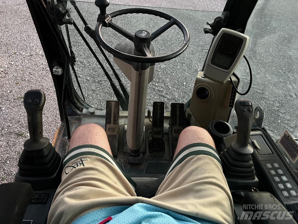 CAT M 313 C ホイール式油圧ショベル（パワーショベル・ユンボ・バックホー）