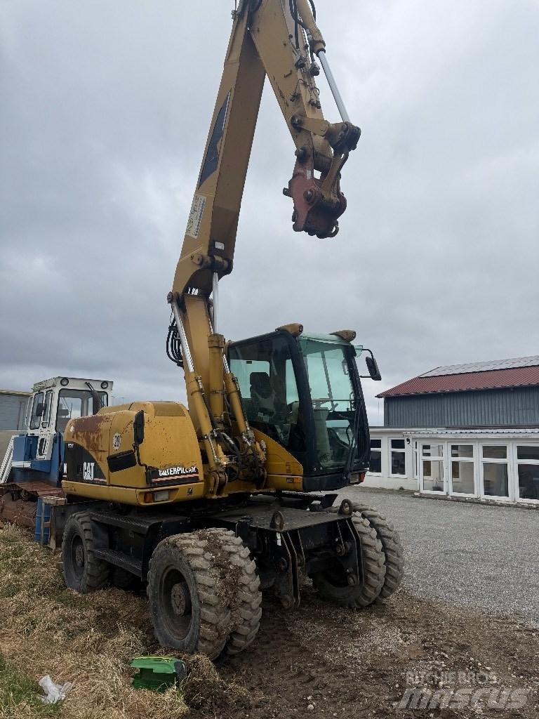 CAT M 313 C ホイール式油圧ショベル（パワーショベル・ユンボ・バックホー）