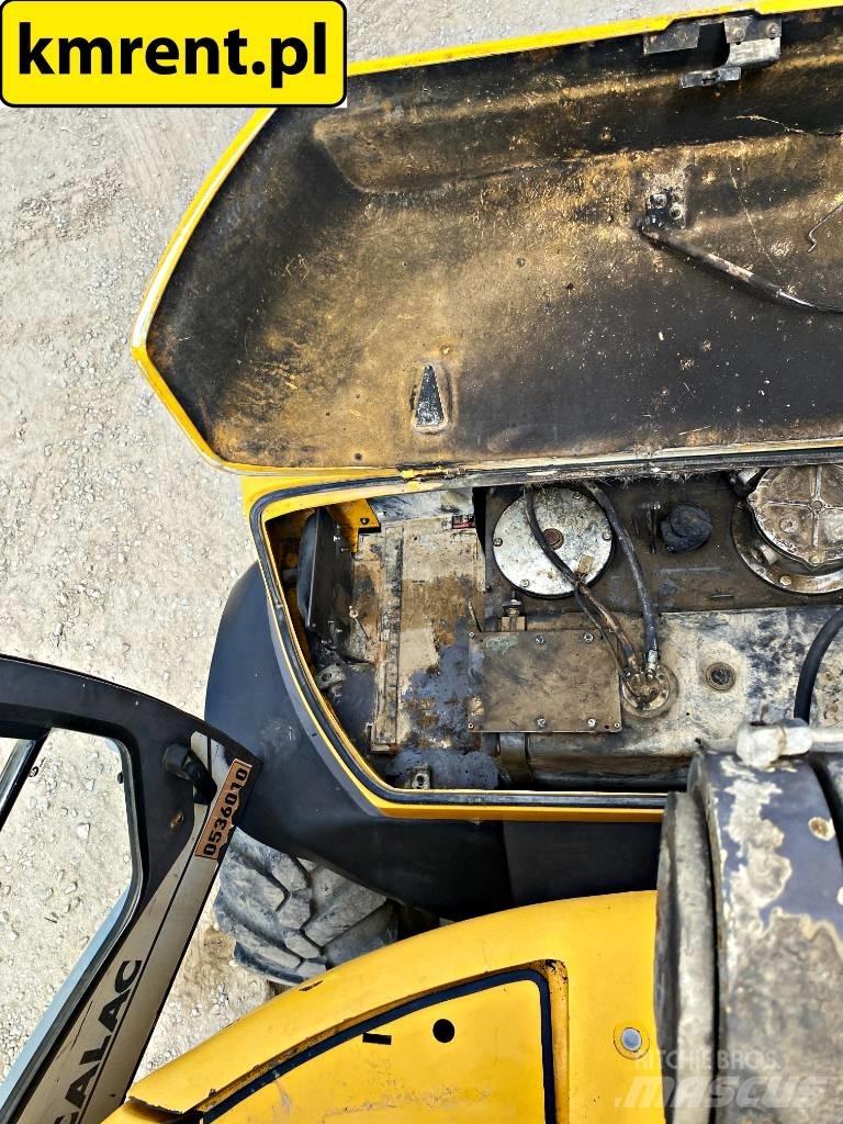 Mecalac 12 M TX バックホーローダー