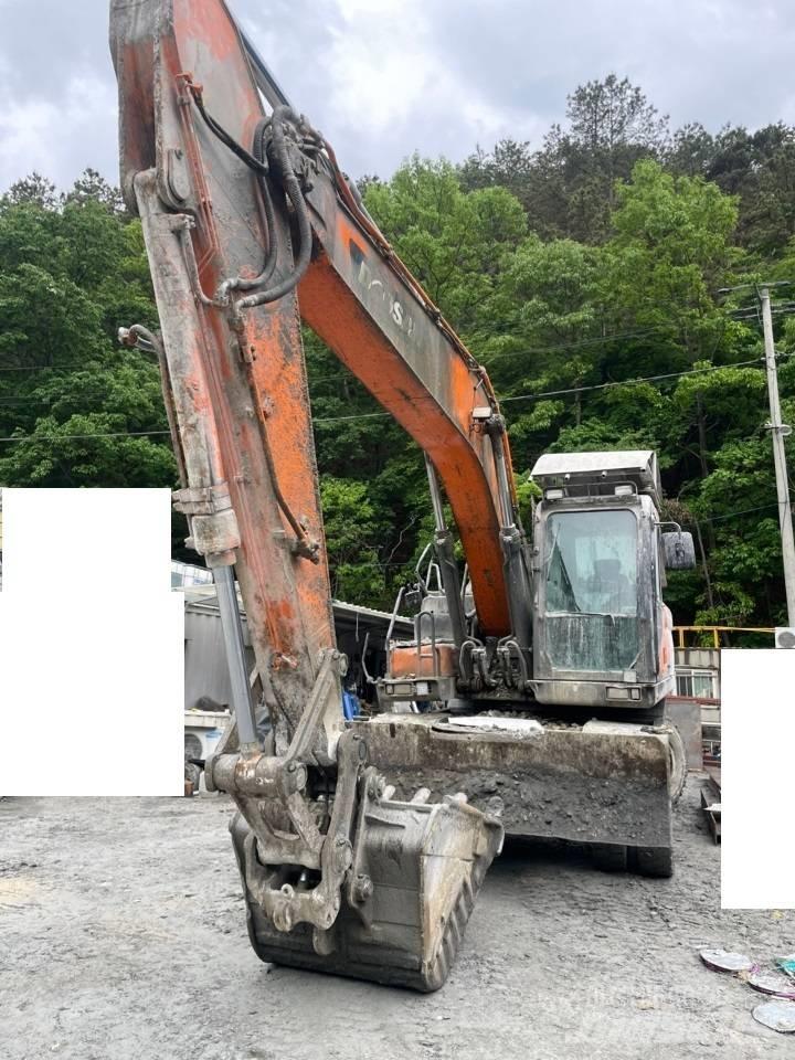 Doosan DX 210 W ホイール式油圧ショベル（パワーショベル・ユンボ・バックホー）
