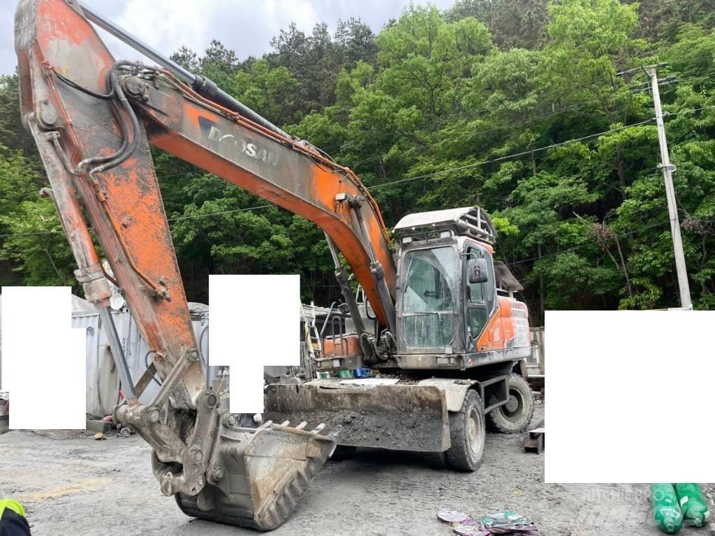 Doosan DX 210 W ホイール式油圧ショベル（パワーショベル・ユンボ・バックホー）