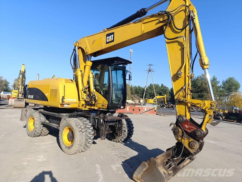 CAT M 318 C ホイール式油圧ショベル（パワーショベル・ユンボ・バックホー）