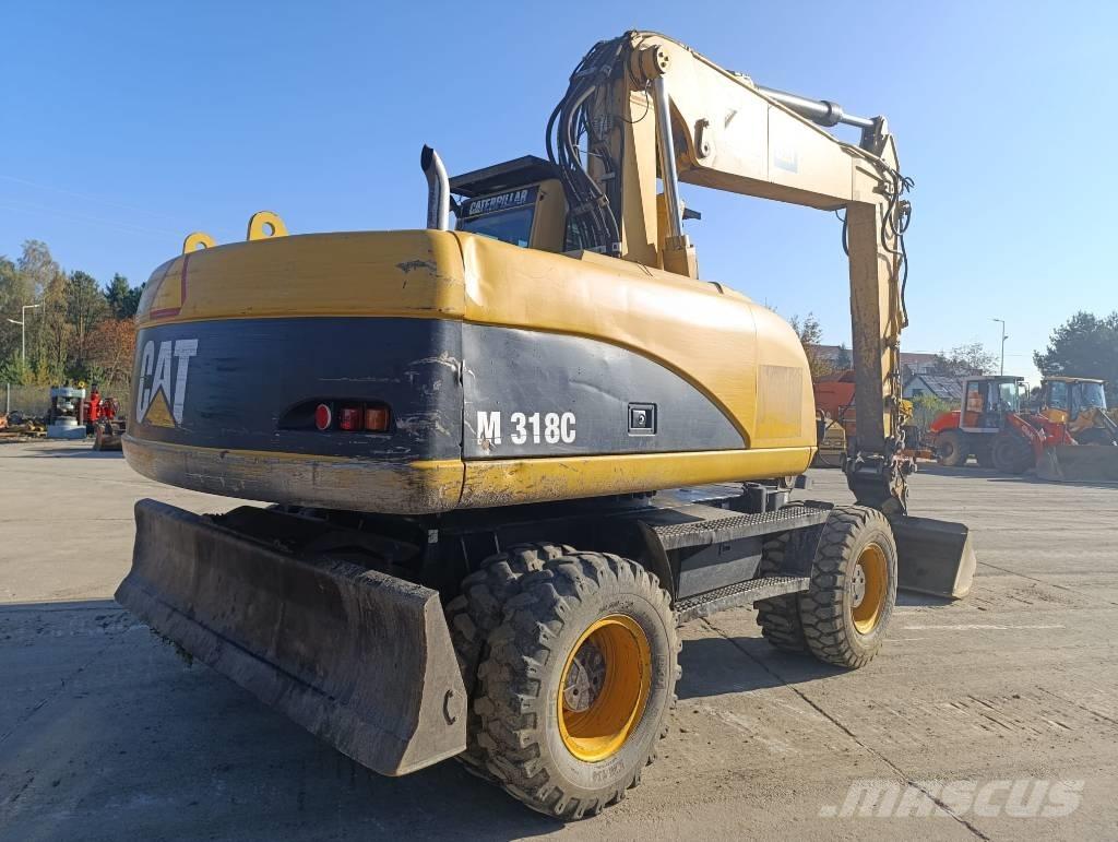 CAT M 318 C ホイール式油圧ショベル（パワーショベル・ユンボ・バックホー）