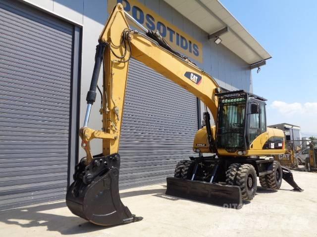 CAT M 318 D ホイール式油圧ショベル（パワーショベル・ユンボ・バックホー）