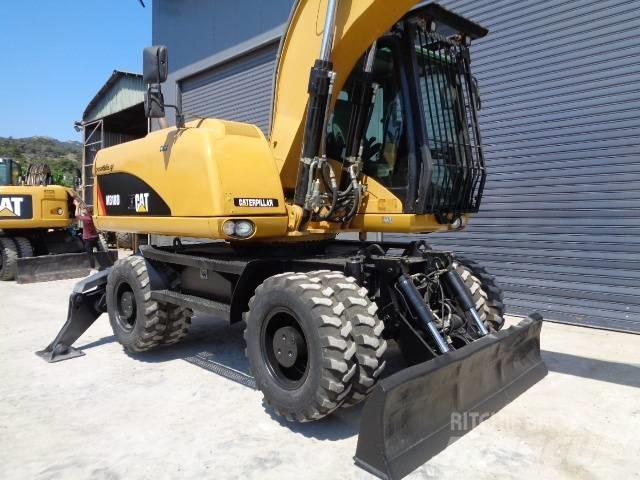 CAT M 318 D ホイール式油圧ショベル（パワーショベル・ユンボ・バックホー）