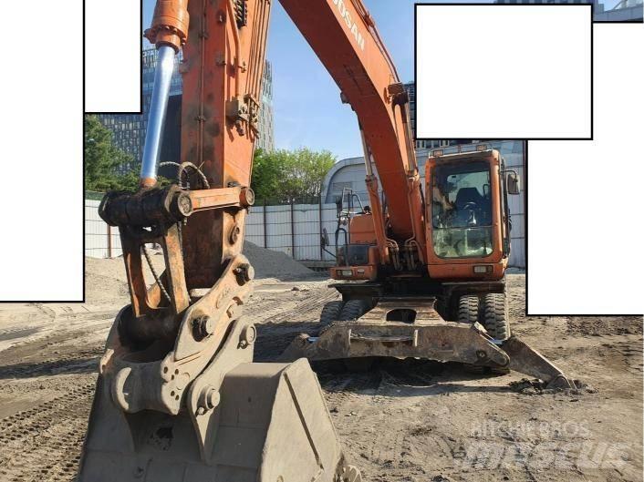 Doosan DX 210 W ホイール式油圧ショベル（パワーショベル・ユンボ・バックホー）