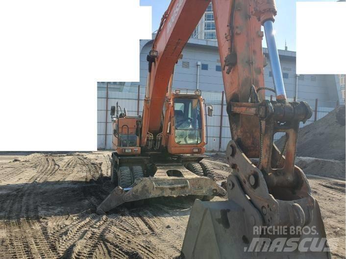 Doosan DX 210 W ホイール式油圧ショベル（パワーショベル・ユンボ・バックホー）