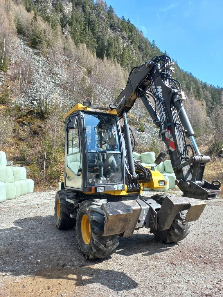 Mecalac 12 M XT バックホーローダー