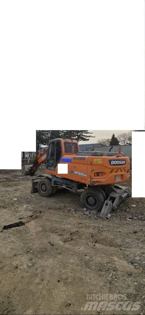Doosan DX 210 W ホイール式油圧ショベル（パワーショベル・ユンボ・バックホー）
