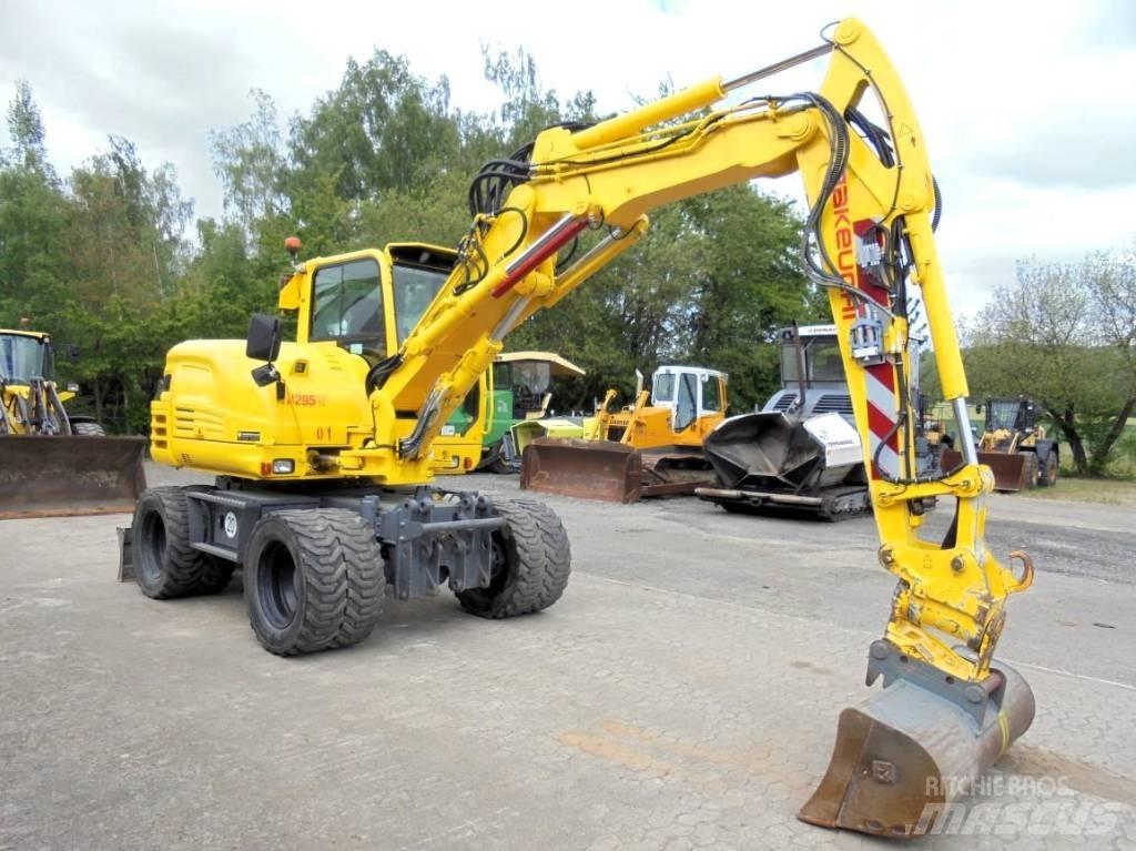 Takeuchi TB 295 W-2 ホイール式油圧ショベル（パワーショベル・ユンボ・バックホー）