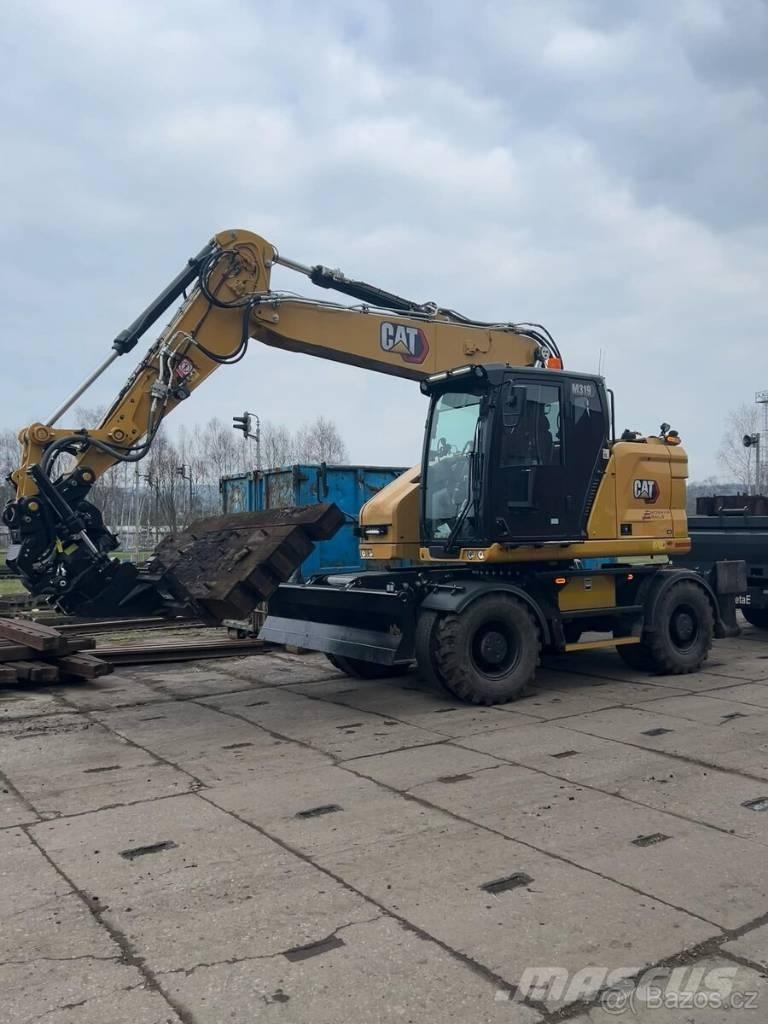 CAT M 319 ホイール式油圧ショベル（パワーショベル・ユンボ・バックホー）
