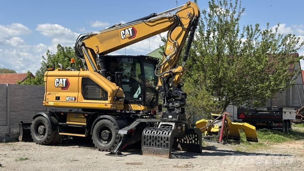 CAT M 319 ホイール式油圧ショベル（パワーショベル・ユンボ・バックホー）