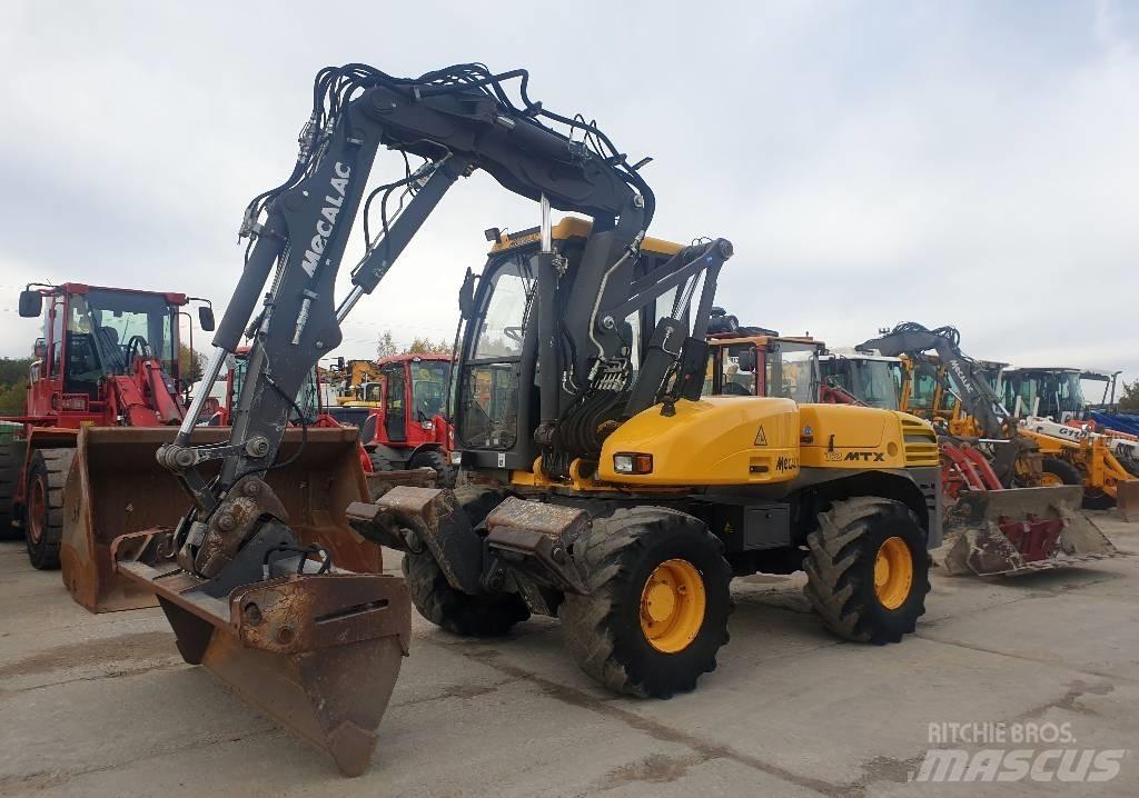 Mecalac 12 M TX ホイール式油圧ショベル（パワーショベル・ユンボ・バックホー）