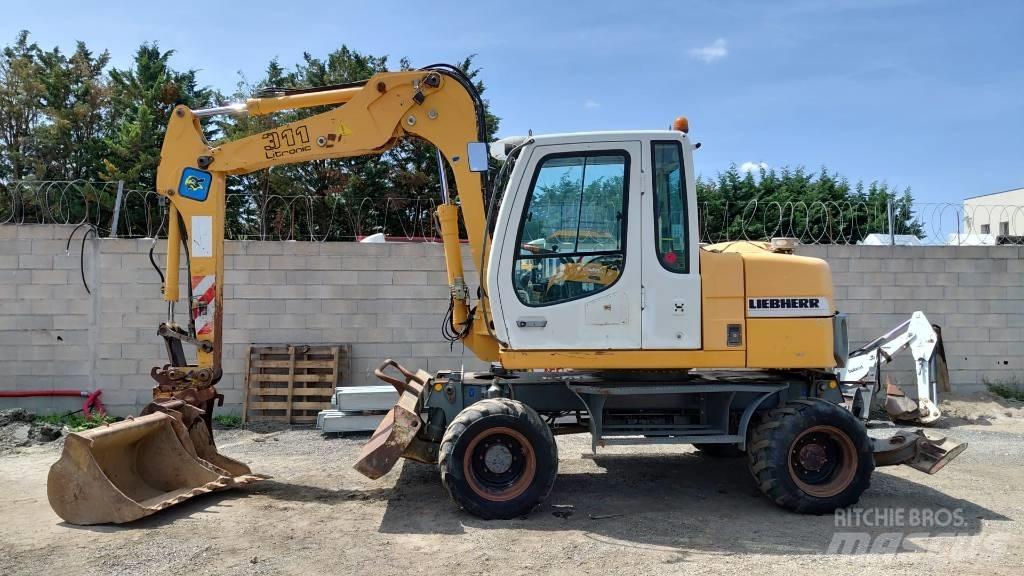 Liebherr A 311 ホイール式油圧ショベル（パワーショベル・ユンボ・バックホー）