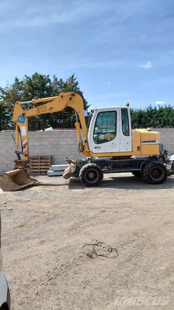 Liebherr A 311 ホイール式油圧ショベル（パワーショベル・ユンボ・バックホー）