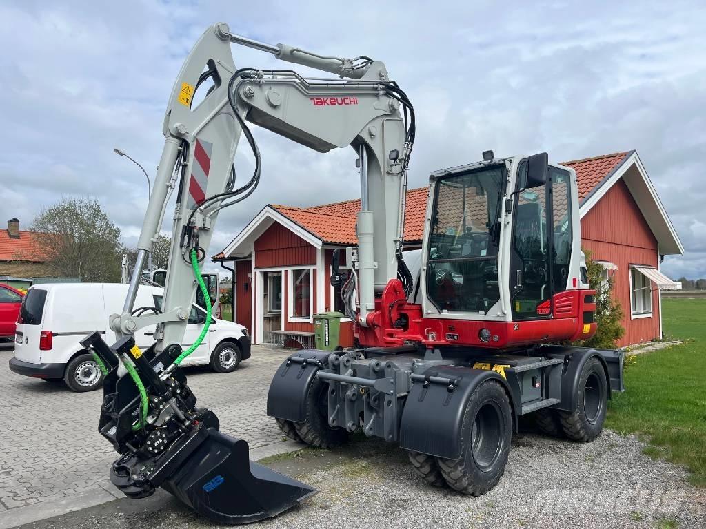 Takeuchi TB 395 W ホイール式油圧ショベル（パワーショベル・ユンボ・バックホー）