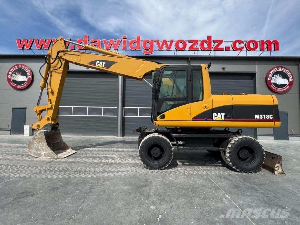 CAT M 318 C ホイール式油圧ショベル（パワーショベル・ユンボ・バックホー）