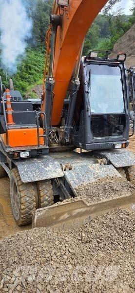 Doosan D 140W-5 ホイール式油圧ショベル（パワーショベル・ユンボ・バックホー）