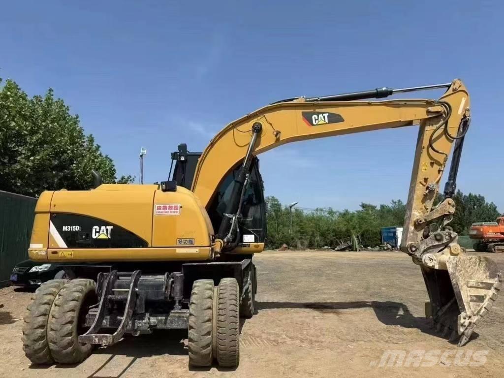 CAT M 315 D ホイール式油圧ショベル（パワーショベル・ユンボ・バックホー）