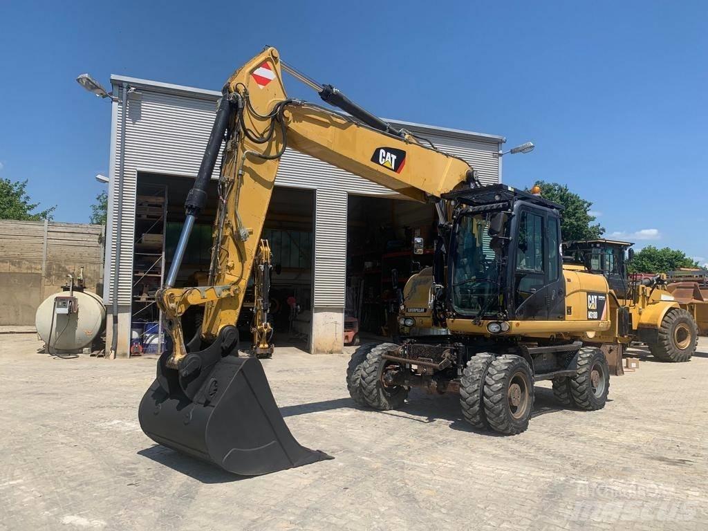 CAT M 318 D ホイール式油圧ショベル（パワーショベル・ユンボ・バックホー）
