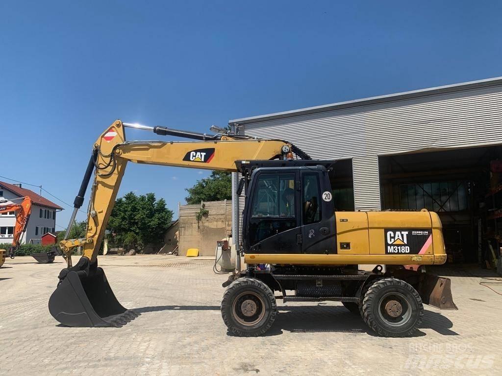 CAT M 318 D ホイール式油圧ショベル（パワーショベル・ユンボ・バックホー）