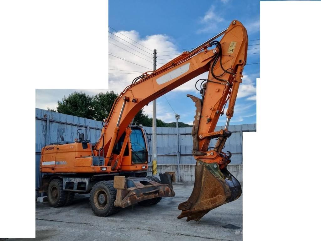 Doosan DX 210 W ホイール式油圧ショベル（パワーショベル・ユンボ・バックホー）