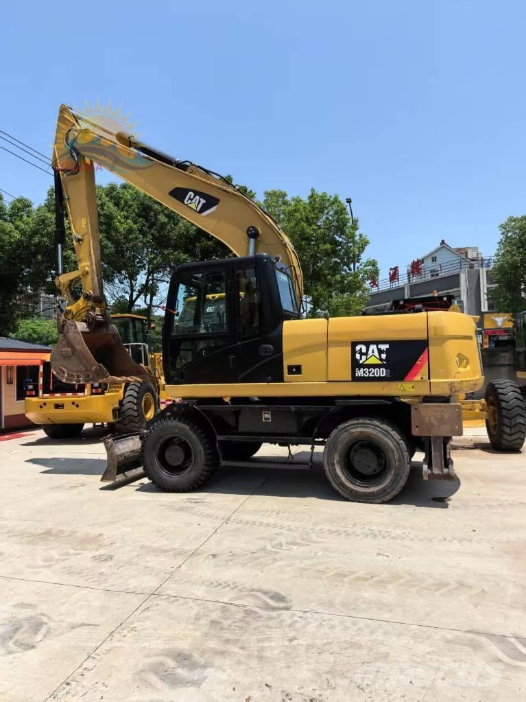 CAT M 320D2 ホイール式油圧ショベル（パワーショベル・ユンボ・バックホー）