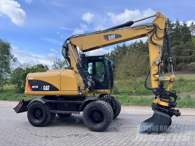 CAT M 315 D ホイール式油圧ショベル（パワーショベル・ユンボ・バックホー）