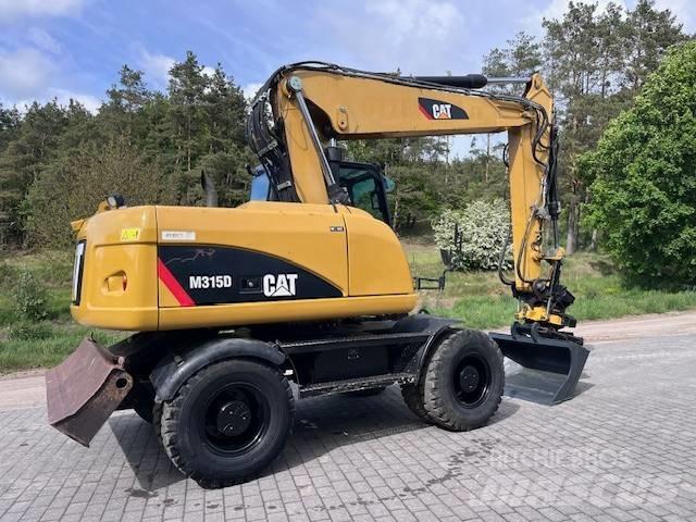CAT M 315 D ホイール式油圧ショベル（パワーショベル・ユンボ・バックホー）