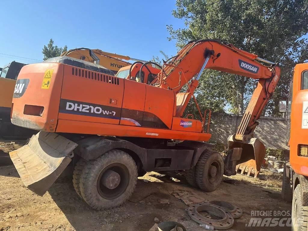 Doosan DH 210 W ホイール式油圧ショベル（パワーショベル・ユンボ・バックホー）