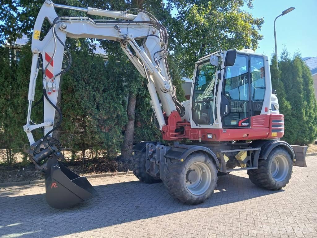 Takeuchi TB 295 W ホイール式油圧ショベル（パワーショベル・ユンボ・バックホー）