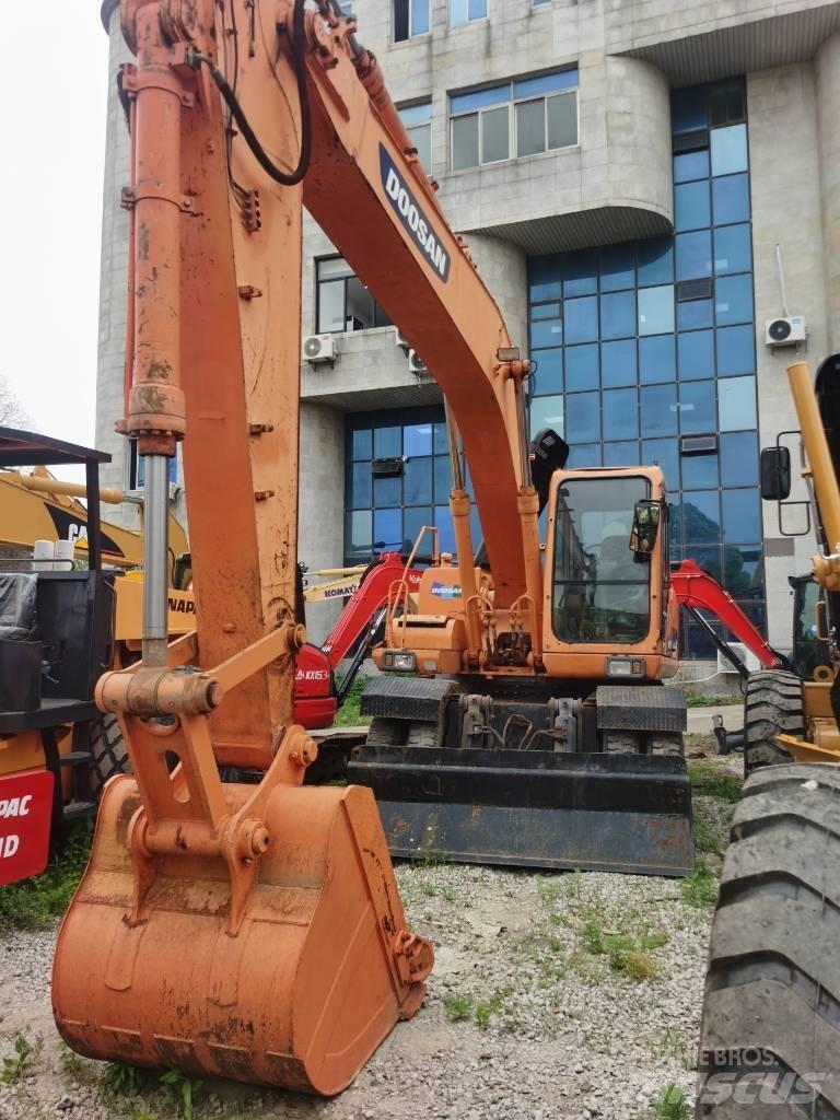 Doosan DH 210 W-7 ホイール式油圧ショベル（パワーショベル・ユンボ・バックホー）
