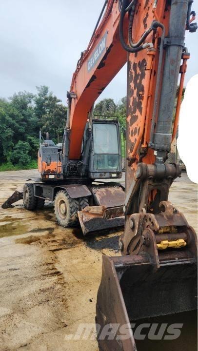 Doosan DX 210 W ホイール式油圧ショベル（パワーショベル・ユンボ・バックホー）
