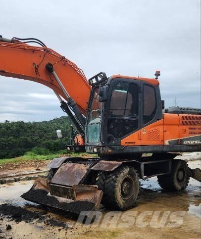 Doosan DX 210 W ホイール式油圧ショベル（パワーショベル・ユンボ・バックホー）