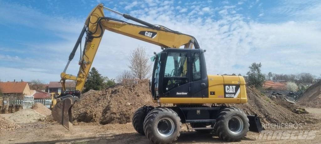 CAT M 313 D ホイール式油圧ショベル（パワーショベル・ユンボ・バックホー）