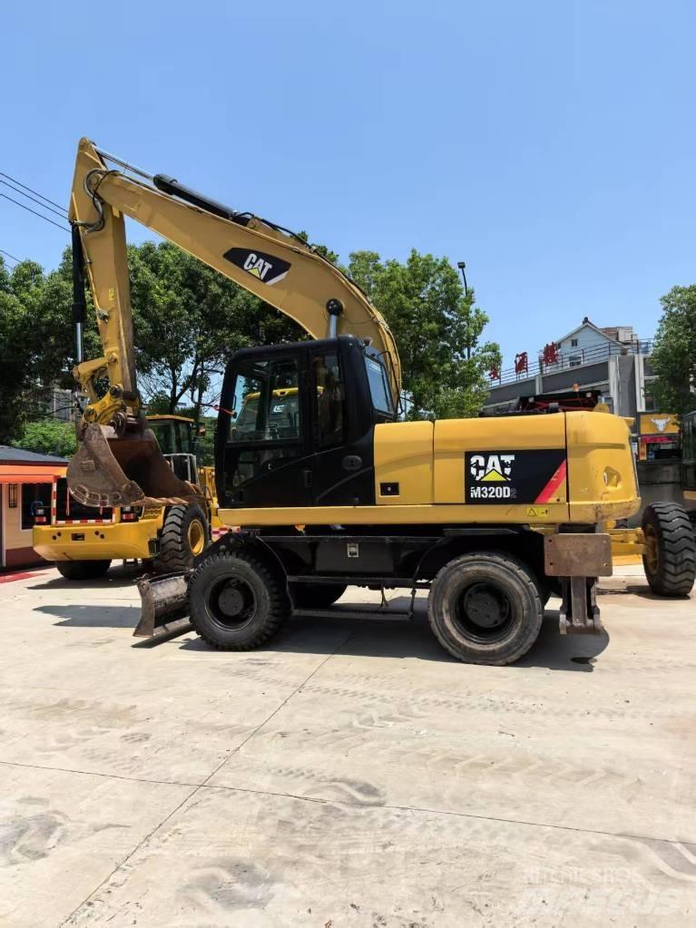 CAT M 320 ホイール式油圧ショベル（パワーショベル・ユンボ・バックホー）