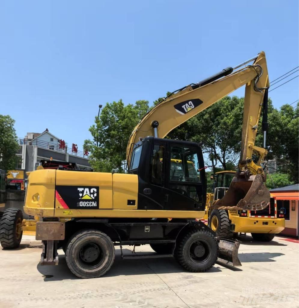 CAT M 320 ホイール式油圧ショベル（パワーショベル・ユンボ・バックホー）