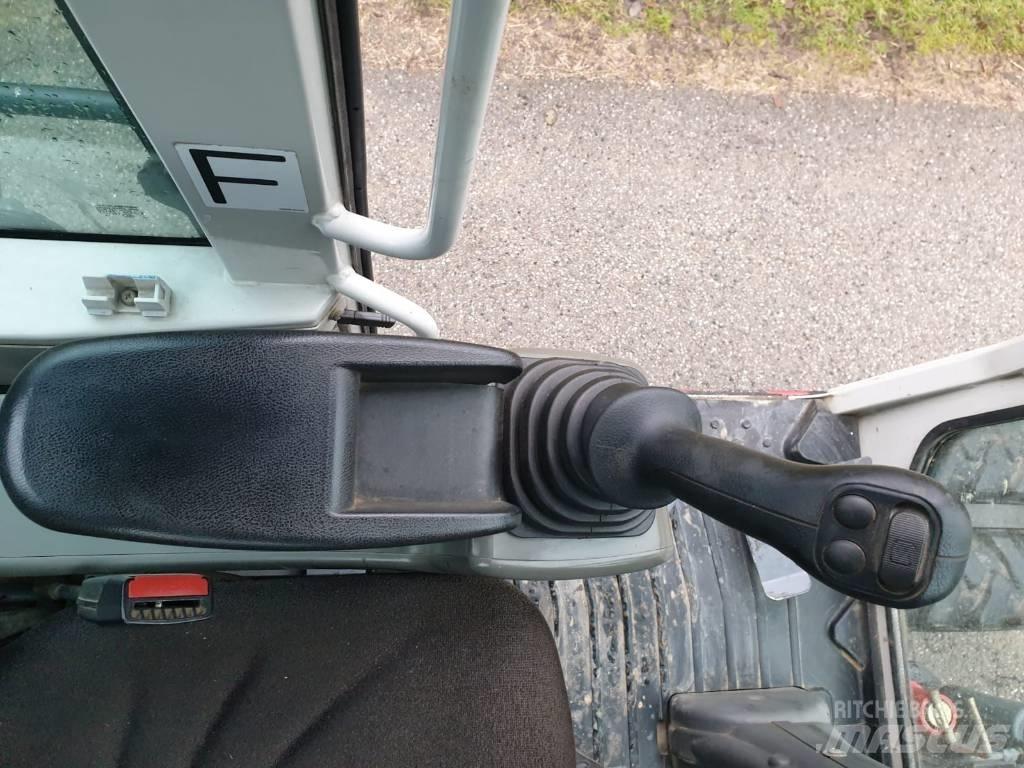 Takeuchi TB 295 W ホイール式油圧ショベル（パワーショベル・ユンボ・バックホー）